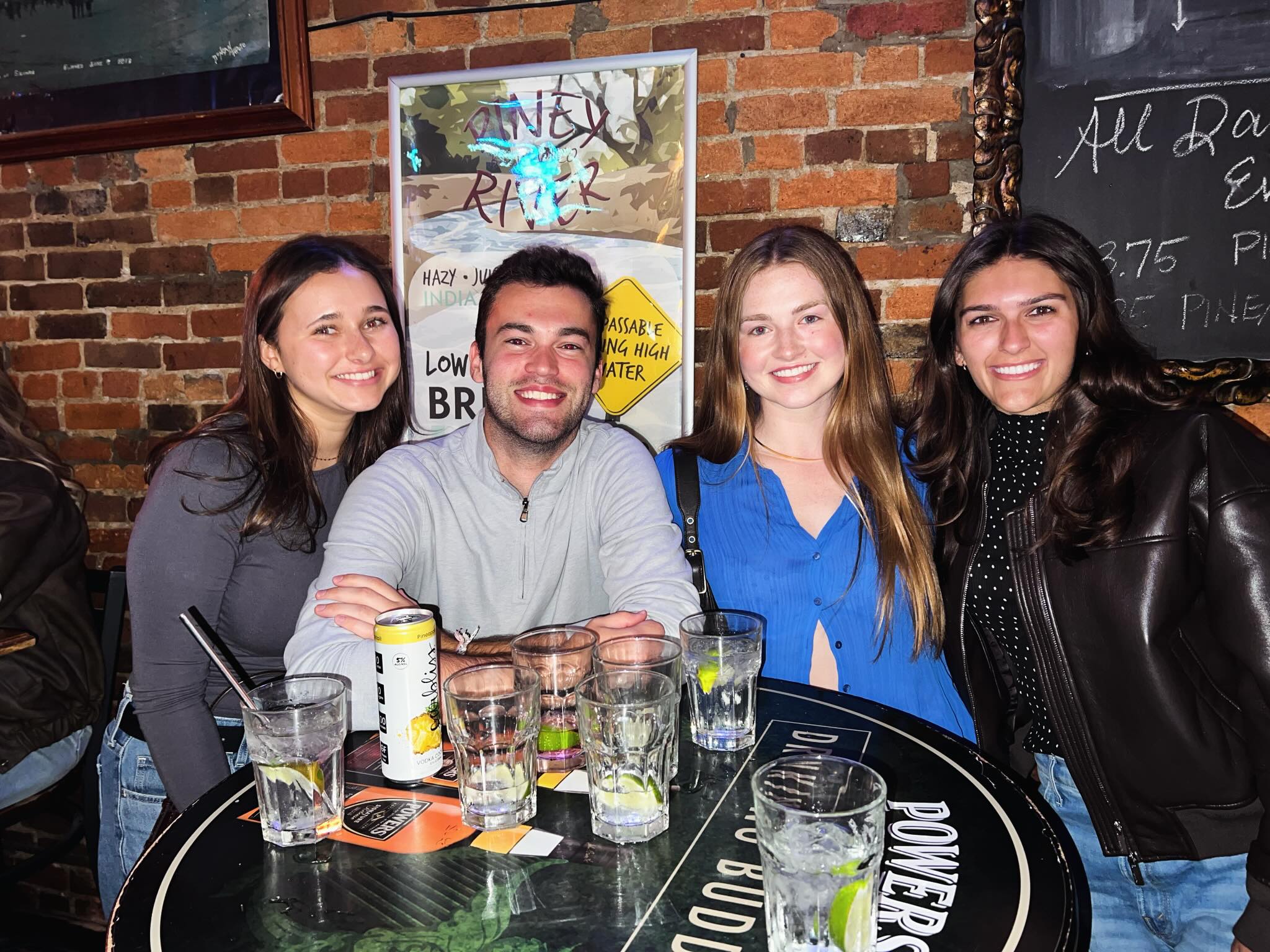 Friends gathered around a table after work
