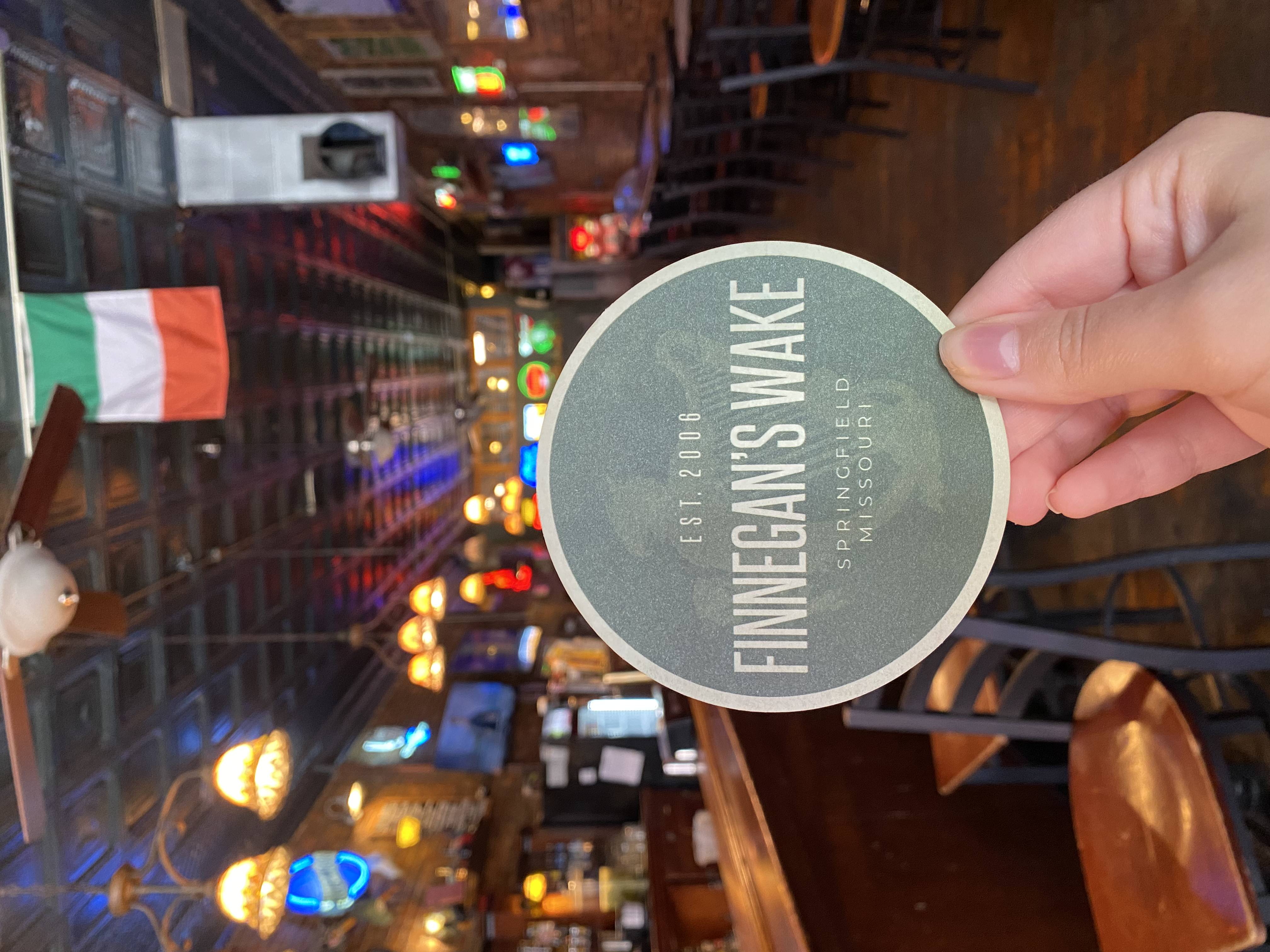 Finnegan's Wake coaster held up in the pub