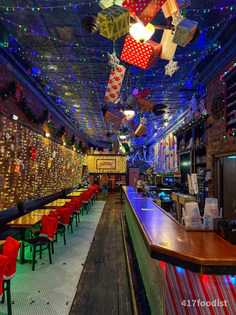 Finnegan's Wake bar with presents hanging from the ceiling