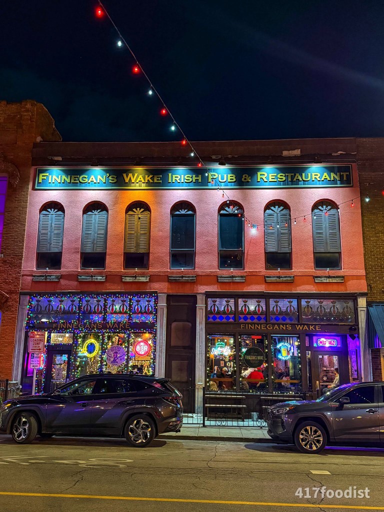 Finnegan's Wake Irish Pub building exterior at night during Finnsmas