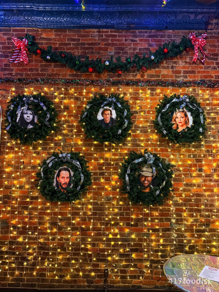 Holiday wreaths with celebrity portraits at Finnegan's Wake