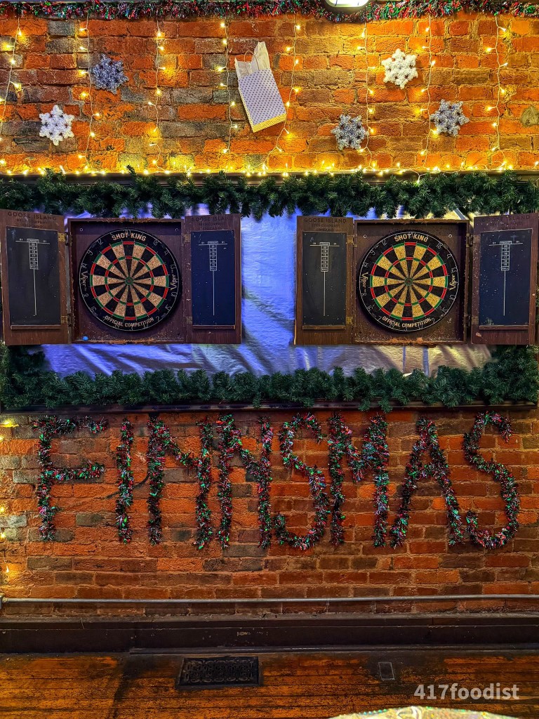 Dartboards with Finnsmas spelled in tinsel