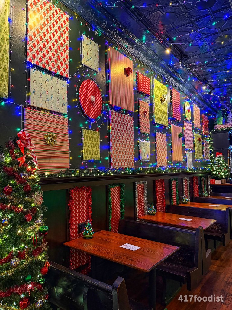 Booths and wrapping-paper wall decorated for Finnsmas