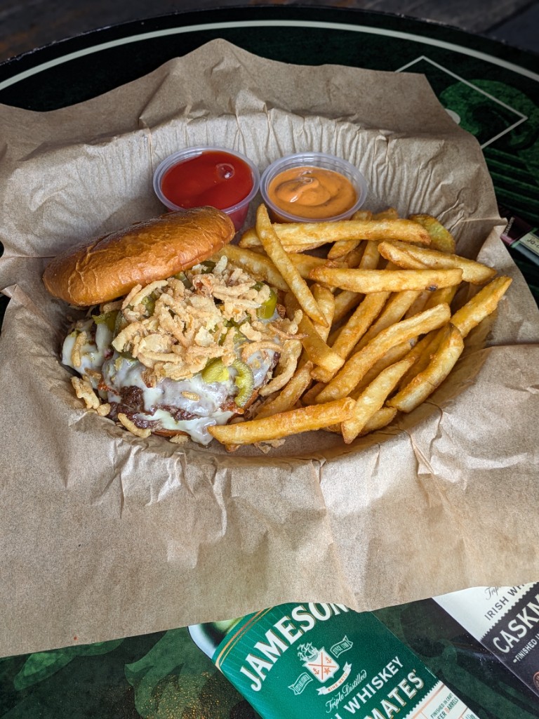Spicy burger with fries