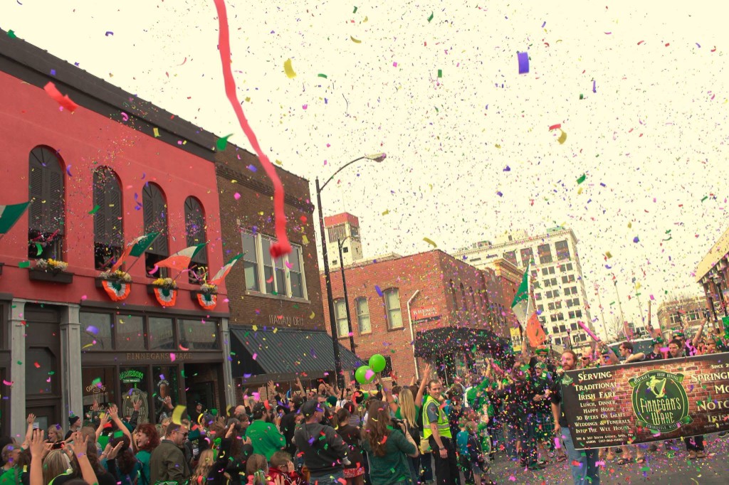 St. Patrick's Day parade crowd celebrating in front of Finnegan's Wake