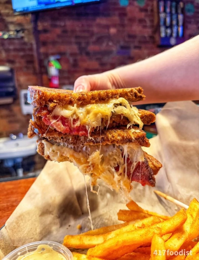 Reuben with cheese pull